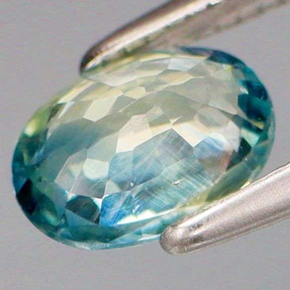Strong color seperation! .98ct blue and yellow Parti Sapphire! Heated only!