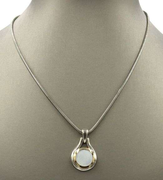 Tiffany & Co 2 tone mother of pearl pendant on snake chain