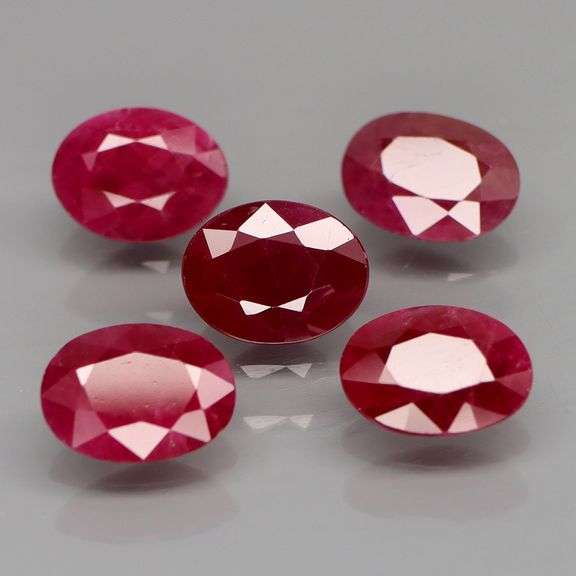 Deep color in this heavy 7.28ct Violet red Ruby set!!!