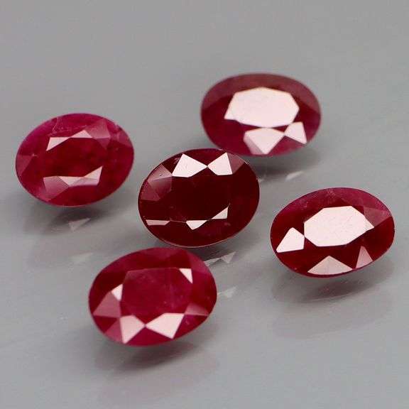 Deep color in this heavy 7.28ct Violet red Ruby set!!!