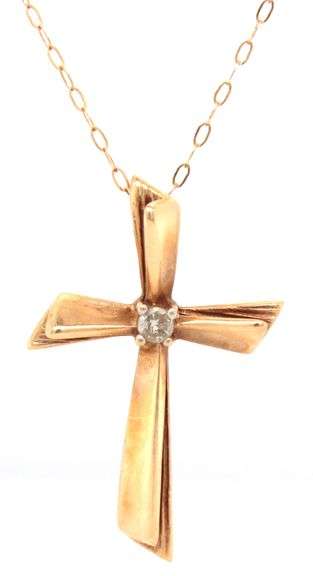 10kt Yellow gold diamond cross pendant on chain