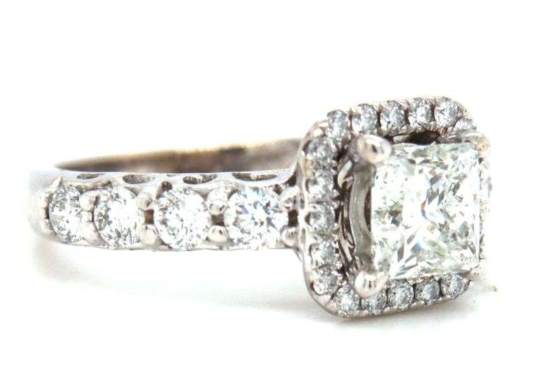 14kt White gold 1ct princess cut in 0.50ctw diamond halo diamond shank setting