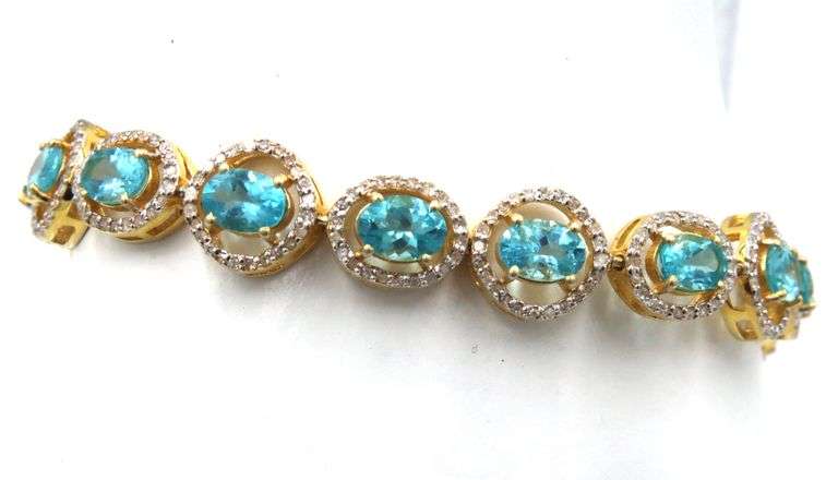 Mesmerizing 11.80CTW Oval Shaped Faceted Apatite & 2.10CTW Diamond Bracelet in 14K Yellow Gold Over 