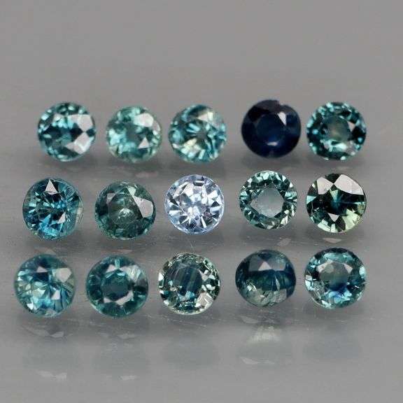 Heated only! 2.70ct blue green Sapphire set