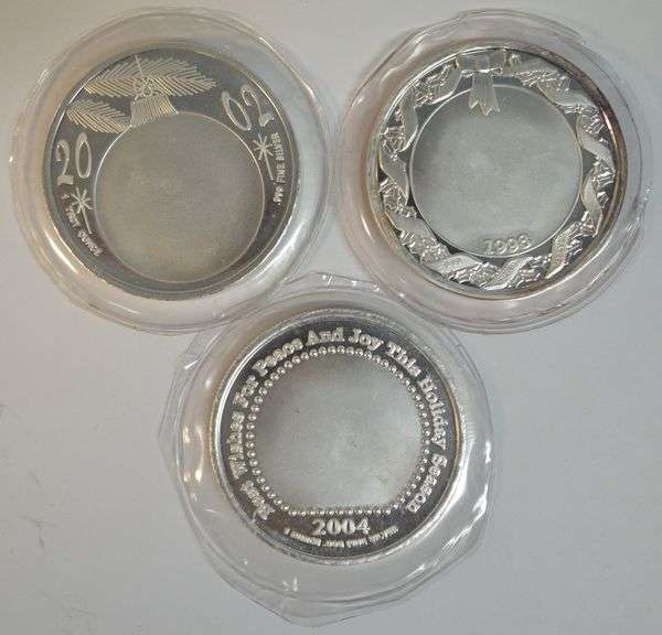 3 Diff. 1 Troy Oz pure .999 fine Silver Christmas medallions in plastic