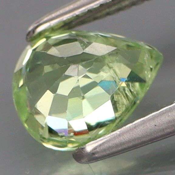 What are we looking at here?!? It's a rare 1.11ct  green Malaya Garnet!