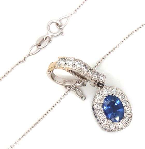 14kt White gold blue sapphire and diamond halo and sapphire under halo enhancer pendant on chain