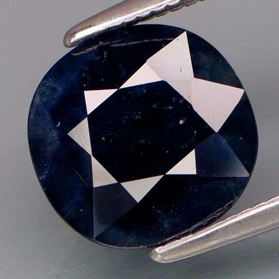 Woah! This 2.94ct Sapphire is midnight blue with silver sparkles!