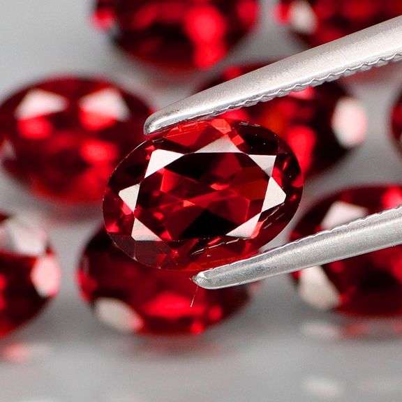 Outstanding color! 9.49ct real pinkish red Garnet set!!
