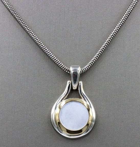 Tiffany & Co 2 tone mother of pearl pendant on snake chain