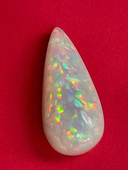 HUGE NATURAL OPAL - 21.05 CARATS PEAR CABOCHON CUT
