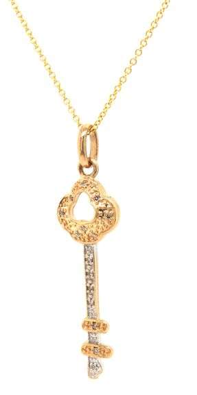 14kt Two tone gold diamond key pendant on chain