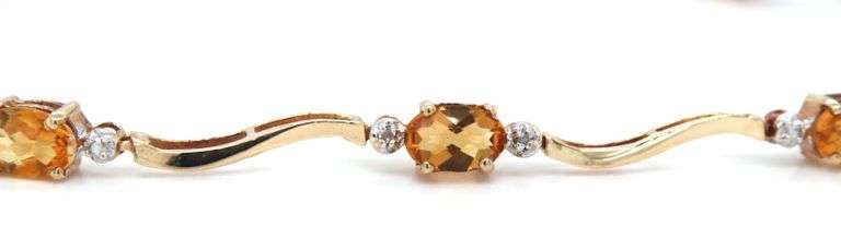 14kt Yellow gold oval citrine woven link station bracelet