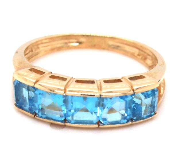 14kt Yellow gold channel set princess cut blue topaz five stone band