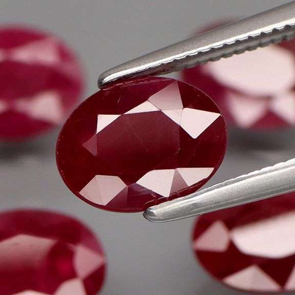 Deep color in this heavy 7.28ct Violet red Ruby set!!!