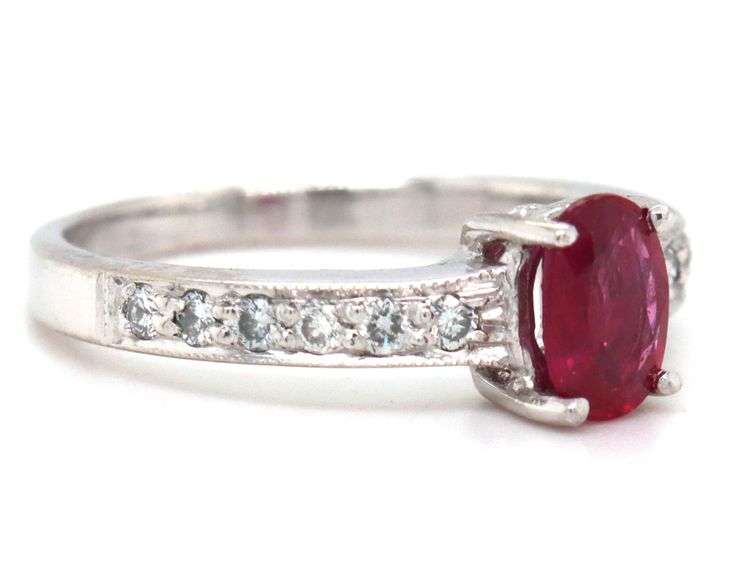 10kt White gold 0.60ct oval ruby and diamond ring