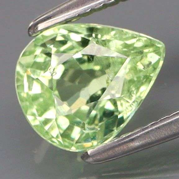 What are we looking at here?!? It's a rare 1.11ct  green Malaya Garnet!