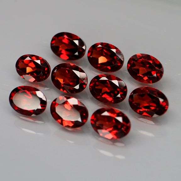 Premium 9.80ct oval cut cherry red Mozambique Garnet set!