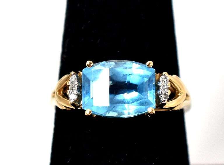 Elegant 10K Yellow Gold Blue Topaz Gemstone Ring with Diamond Accents