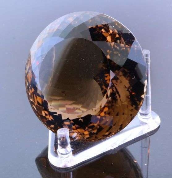 It's a big boy! 206.97 top color Smoky Quartz!