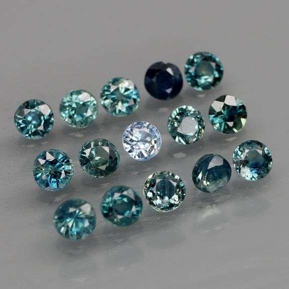Heated only! 2.70ct blue green Sapphire set
