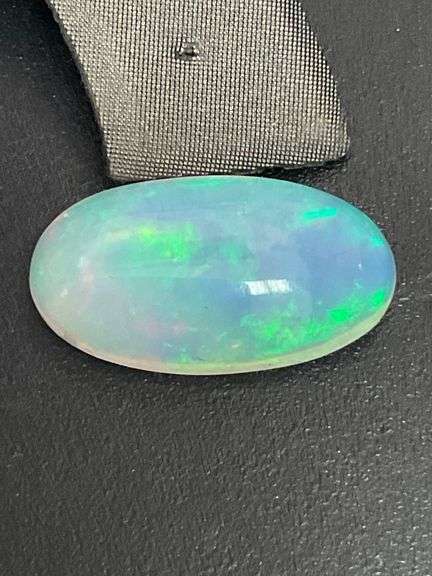 NATURAL OPAL LOOSE-7.48 CARATS OVAL CABOCHON CUT