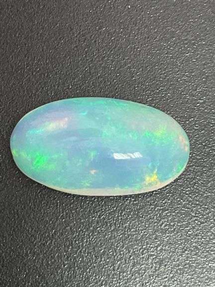 NATURAL OPAL LOOSE-7.48 CARATS OVAL CABOCHON CUT