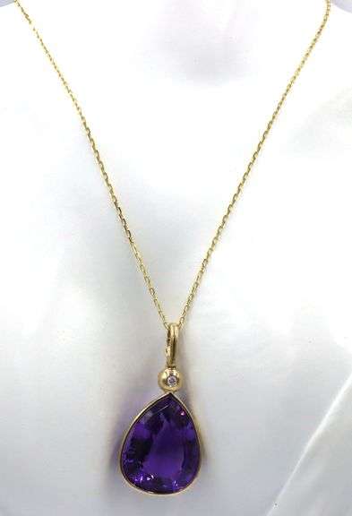 14kt Yellow gold pear shaped amethyst and bezel set diamond enhancer pendant on chain