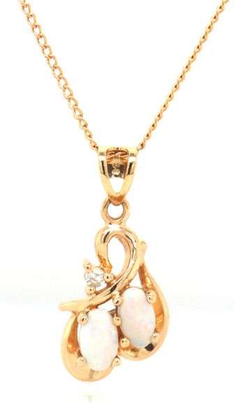 14kt Yellow gold double oval Opal and diamond pendant on chain