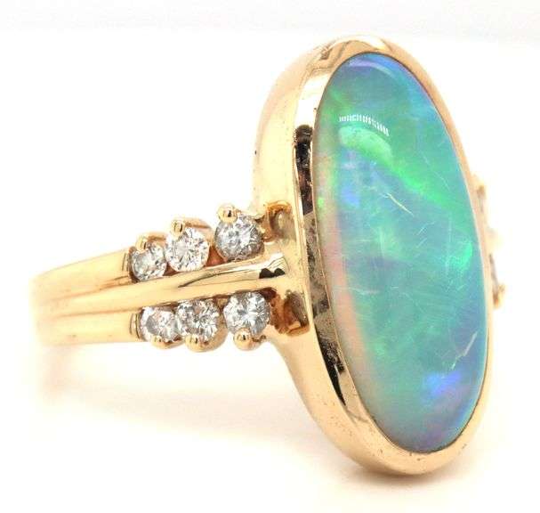 14kt Yellow gold doublet oval opal and diamond ring