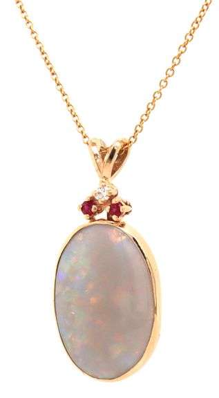 14kt Yellow gold oval opal, ruby and diamond accent pendant on chain