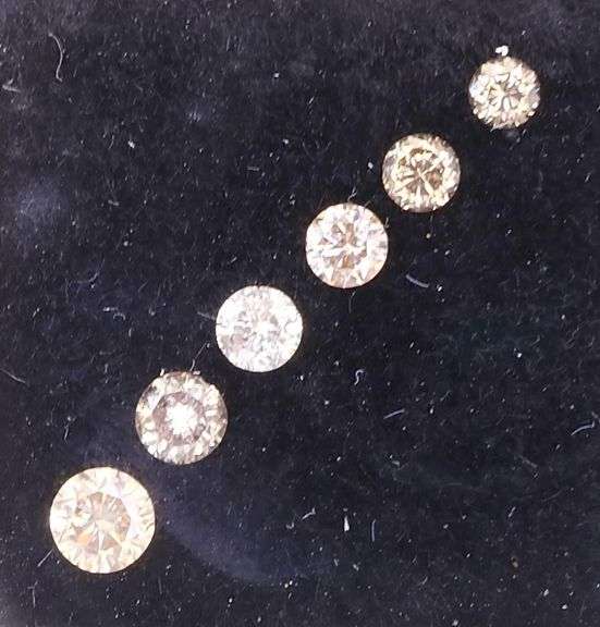 Graduated! 6 piece set of champagne diamonds weighing .44 carats!