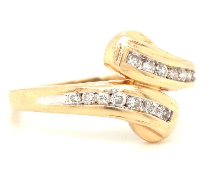 Tasteful 14K YG Diamond Bypass Style Ring