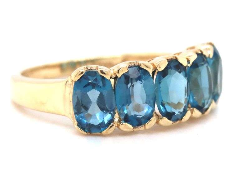 10kt Yellow gold oval blue topaz 5 stone ring