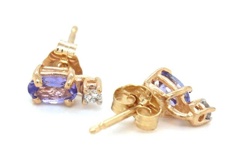 14kt Yellow gold oval tanzanite and diamond stud earrings