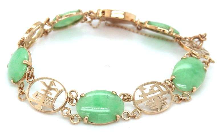 Oval Jade good fortune bracelet in 14kt Yellow gold
