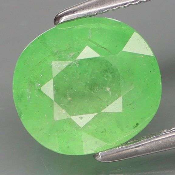 Holy cow! It's a 2.12ct color change Tsavorite Garnet!