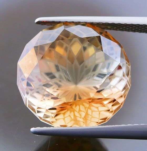 Intricately cut! 19.61ct REAL Imperial Topaz!