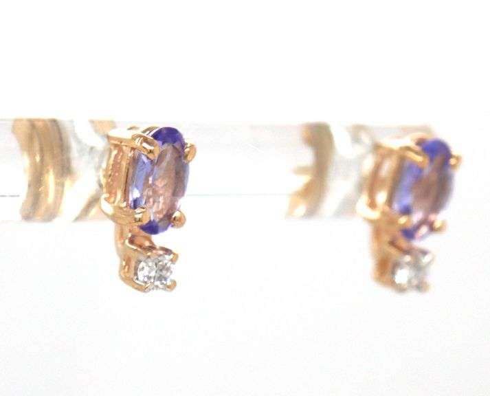 14kt Yellow gold oval tanzanite and diamond stud earrings