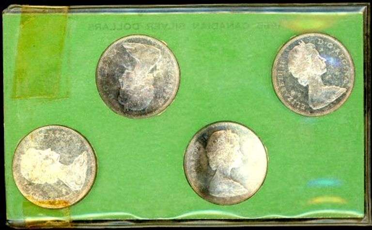 Four Different Varieties of 1965 Canada Silver Dollar