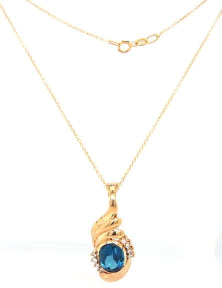 14kt Yellow gold oval London topaz and diamond enhancer pendant on chain