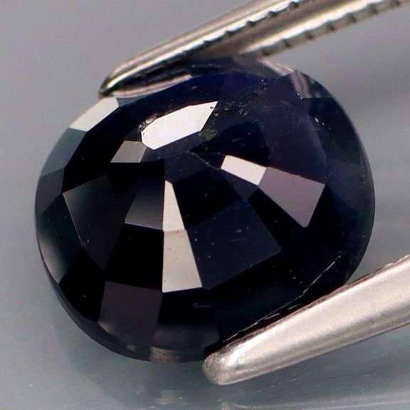 Woah! This 2.94ct Sapphire is midnight blue with silver sparkles!