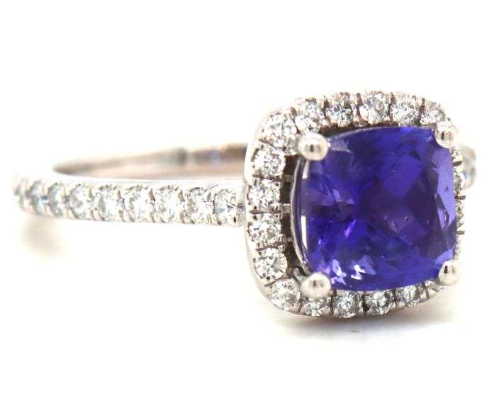 14kt White gold cushion cut Tanzanite and diamond halo ring