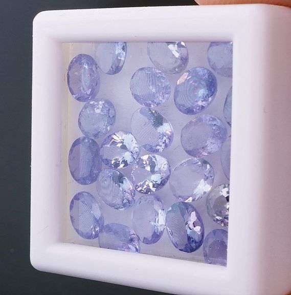 Heavy flashing! Untreated! 6.76ct oval cut Tanzanite set!