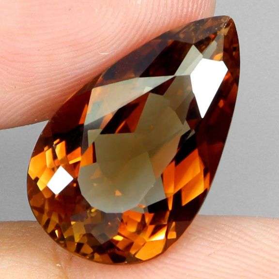 Outstanding 14.07ct VVS grade whiskey red Imperial Topaz
