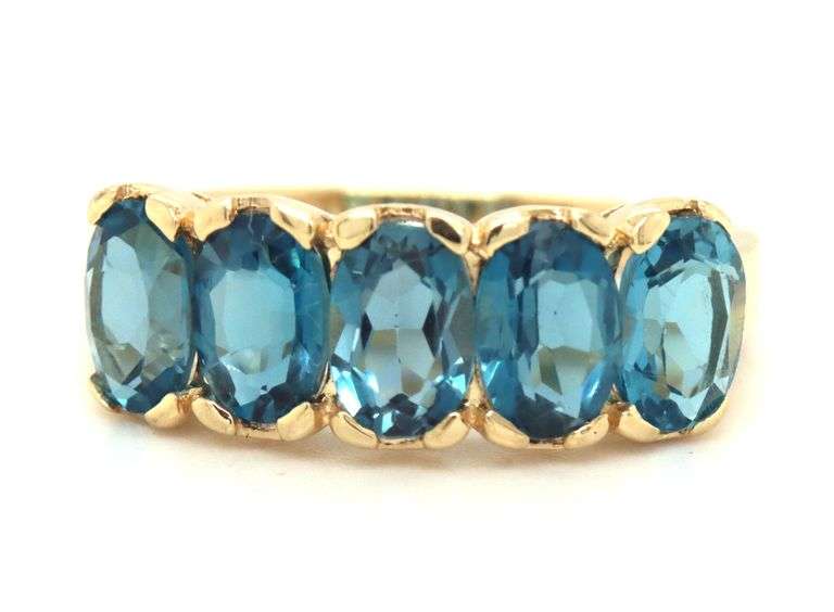 10kt Yellow gold oval blue topaz 5 stone ring