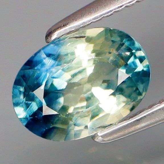 Strong color seperation! .98ct blue and yellow Parti Sapphire! Heated only!