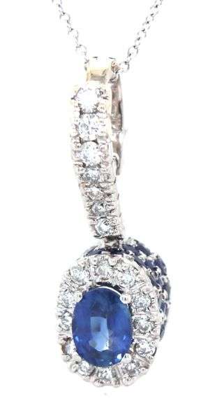 14kt White gold blue sapphire and diamond halo and sapphire under halo enhancer pendant on chain