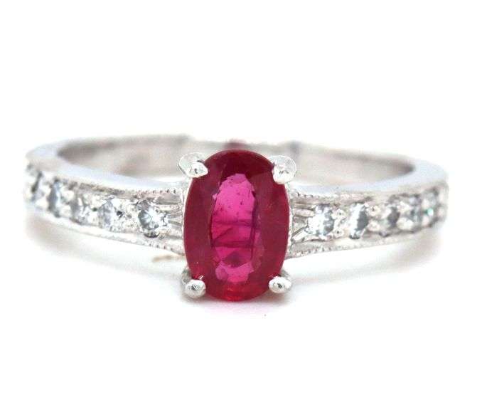 10kt White gold 0.60ct oval ruby and diamond ring