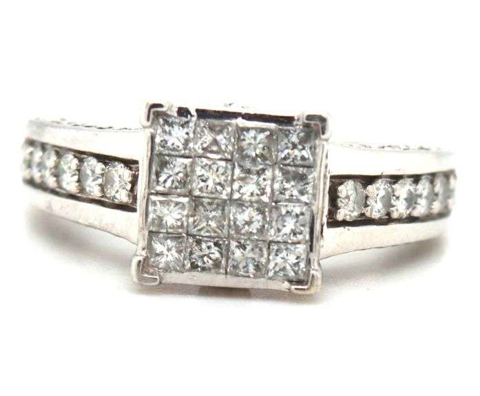14kt White gold 1.25ctw Invisible set princess cut and round diamond engagement ring